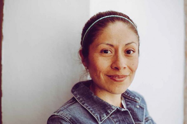 Portrait of a woman in front of a white background